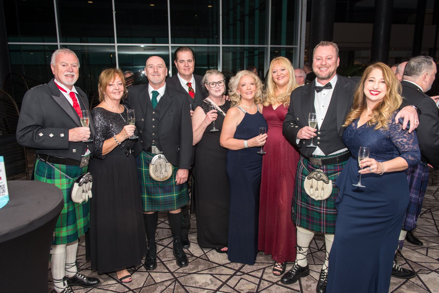 Members and guests in kilts and black-tie gathered with champagne at the Westside Burns Supper